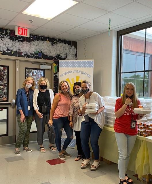 employees enjoying breakfast